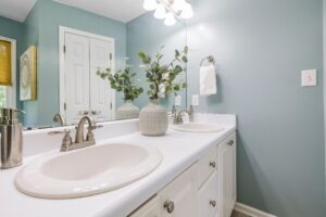 Bathroom walls painted in pale blue